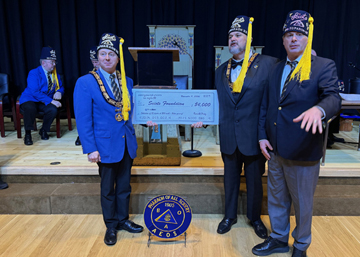 Jumbo Check being presented to Sciots Foundation